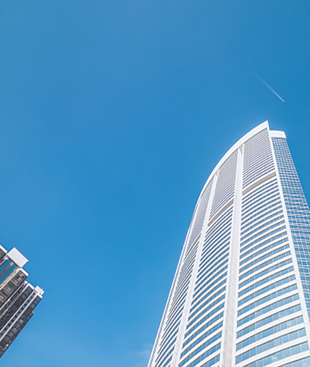 Modern tower rising into a clear blue sky